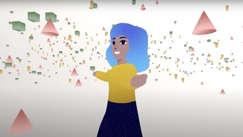 a screenshot of an animation where a person is standing in front of a white background marveling at a number of multicolored shapes swirling in the air around her