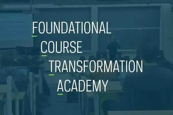 White text that reads Foundational Course Transformation Academy over a blue-tinted photo of a professor speaking to a class. The first letter of each word is underlined in green to indicate the program's acronym (FCTA).